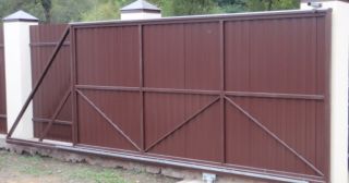 Купить откатные ворота из профнастила Усть-Джегута, цена от 1738 руб.