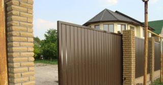 Купить откатные ворота из профнастила Усть-Джегута, цена от 1738 руб.